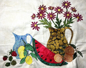 Block 6, 17-inch square for a corner. Added peaches, lemons, lemonade pitcher.