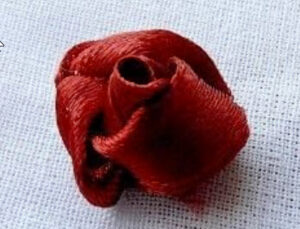 Loops around rose bud